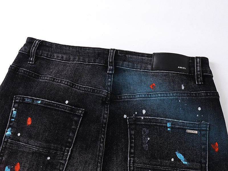 AMIRI Paint Splatter Distressed Black Jeans — detail